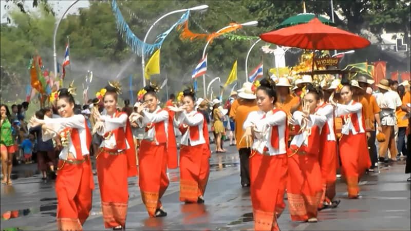 A parade with school kids during Songkran festival. 