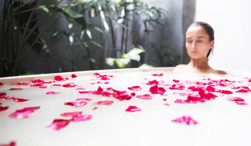 guest enjoying a milk bath as part of a hydrotherapy session in chiang mai