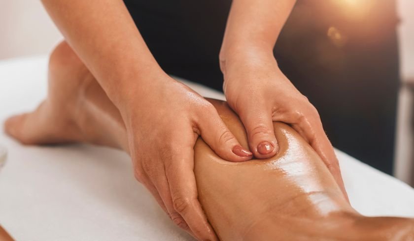 stiff calf muscle being massaged and loosened. 