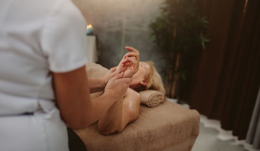 A senior citizen enjoying an aromatherapy massage in chiang mai, thailand.