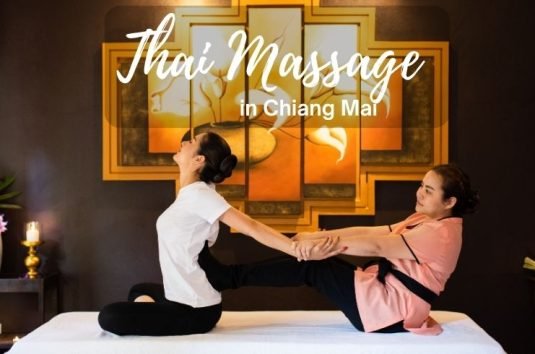 A Guest Enjoying A Yoga Pose During A Thai Massage In Chiang Mai