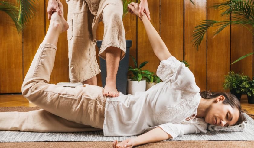 The yoga-like stretches in Thai massage are key to increasing flexibility and range of motion.