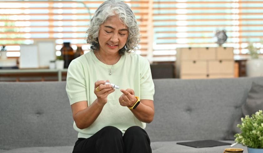 woman who has diabetes checking blood sugar